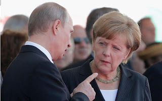 Ο Πούτιν στήνει τη Μέρκελ στον τοίχο: Πρόσεχε τι λες για τη Ρωσία... - Φωτογραφία 1