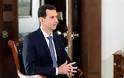 Στην αποχώρηση Άσαντ από την εξουσία εμμένει η συριακή αντιπολίτευση