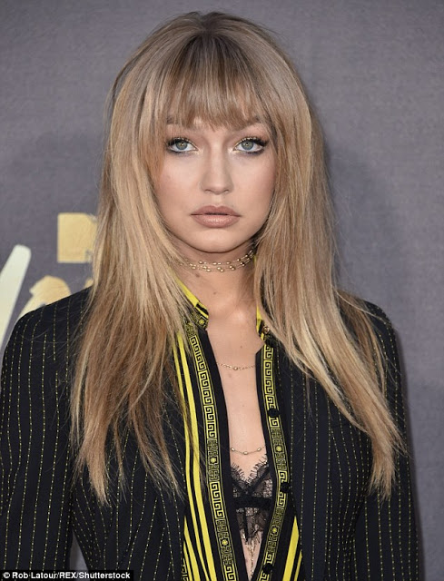 Δείτε την Gigi Hadid σε μια εμφάνιση αλά Brigitte Bardot! [photos] - Φωτογραφία 4