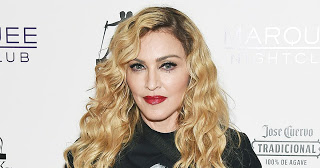 Δείτε πώς ντύθηκε η Madonna για να βγει βόλτα με τον γιο της... [photos] - Φωτογραφία 1