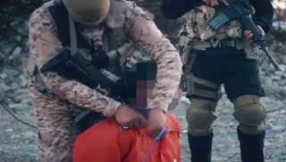 Απίστευτη κτηνωδία από το ISIS: Έδεσαν ένα κολιέ με εκρηκτικά στο λαιμό του κρατούμενου και... - Φωτογραφία 1