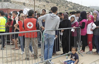 Ο Ελληνικός Ερυθρός Σταυρός διένειμε μεγάλη ποσότητα ανθρωπιστικής βοήθειας στο Τοπικό Κέντρο Διαχείρισης Προσφύγων Σκαραμαγκά - Φωτογραφία 1
