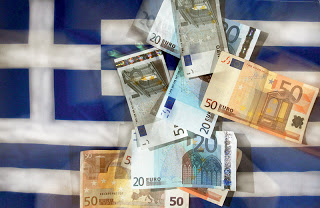 Guardian: Το ΔΝΤ φέρνει δώρα στους Έλληνες - Φωτογραφία 1