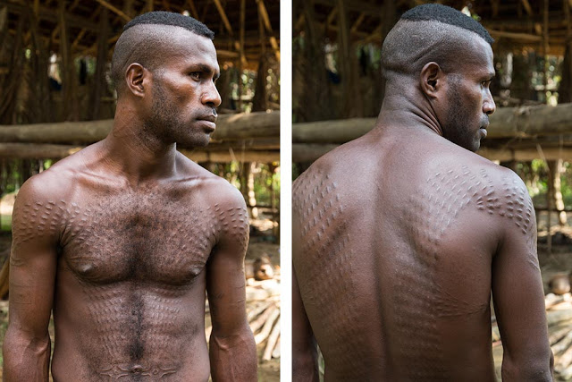 Εικόνες - ΣΟΚ! Φυλή στην Παπούα κάνει τα... σημάδια του κροκόδειλου με ΞΥΡΑΦΙ για να... [photos] - Φωτογραφία 2