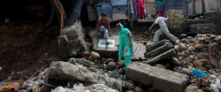 Ινδία: Φόβοι για τουλάχιστον 40 νεκρούς λόγω των βροχοπτώσεων και των κατολισθήσεων στο Ουταραχάντ - Φωτογραφία 1
