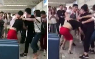Χαμός σε αεροδρόμιο στην Κίνα! Γυναίκα εντοπίζει τον σύζυγό της με την ερωμένη του και της... επιτίθεται! - Φωτογραφία 1