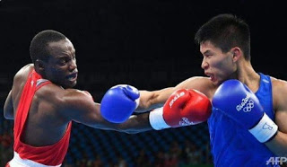 Ένας από τους χειρότερους εφιάλτες του αθλητή: Κινέζος πυγμάχος νομίζει λανθασμένα ότι κέρδισε τον αγώνα στους Ολυμπιακούς - Φωτογραφία 1