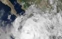 Δύο νεκροί και τρεις αγνοούμενοι από το πέρασμα του τυφώνα Νιούτον στο Μεξικό - Φωτογραφία 6