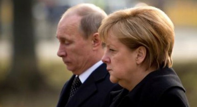 Μέρκελ καλεί Πούτιν για τη βία στην ανατολική Ουκρανία - Φωτογραφία 1